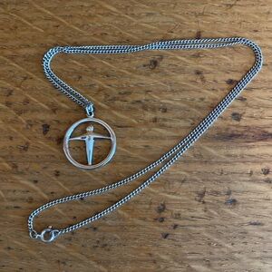 Tiffany & Co Sterling silver “Manpower” charm and necklace